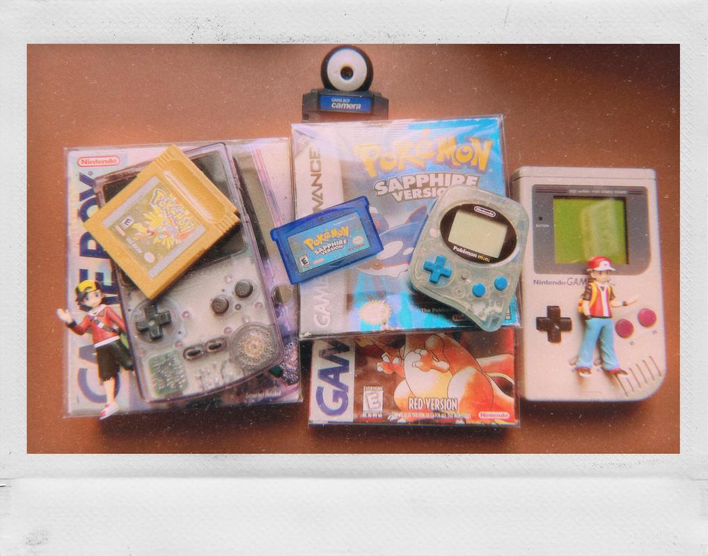 Some of BlueArticuno’s beloved items, including his Game Boys, Pokémon games, and some cool figures of Red and Ethan